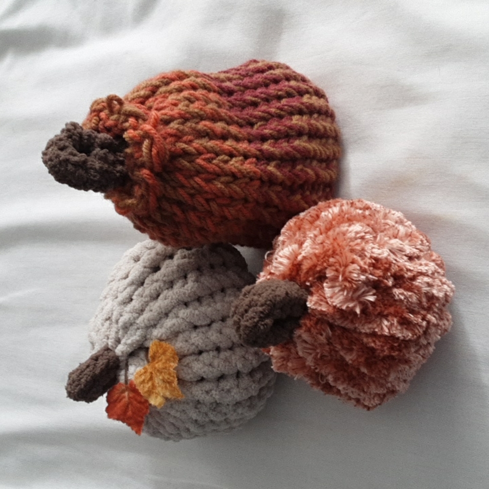 Handmade knit pumpkin display
